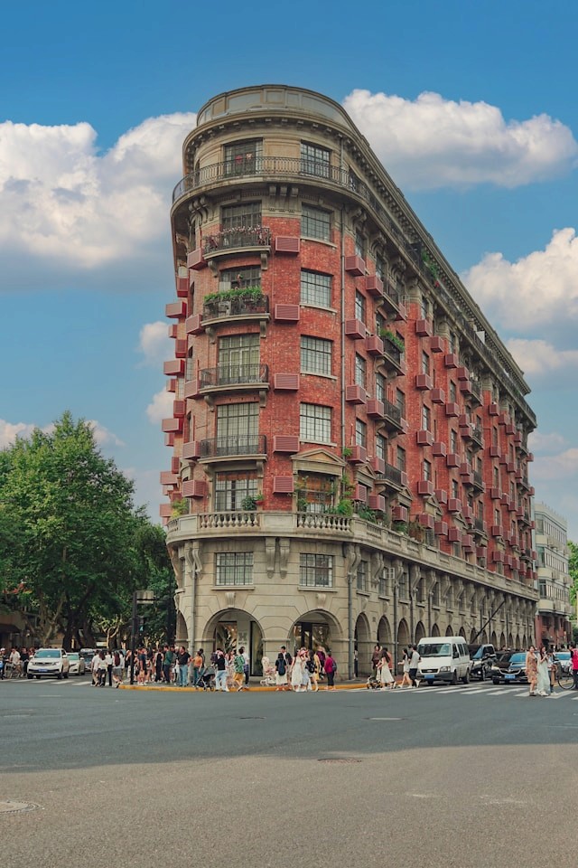A historic wooden-fronted pedestrian street with a covered market arcade